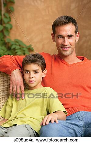 Portrait of a father and young son View Large Photo Image Stock Image - Portrait of a father and young son. Fotosearch