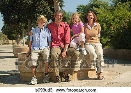 Two generation family on holiday View Large Photo Image Stock Image - Two generation family on holiday. Fotosearch