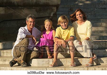 Two generation family sitting on steps View Large Photo Image Stock Photo - Two generation family sitting on steps. Fotosearch