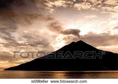 Stock Photography - Volcano in morning sun. Fotosearch