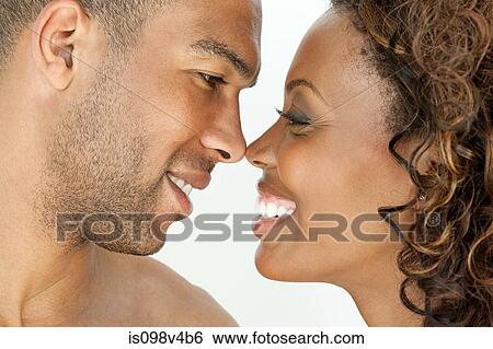 Stock Photograph - Young couple face to face. Fotosearch