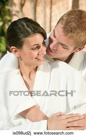 Young couple in bathrobes View Large Photo Image Stock Image - Young couple in bathrobes. Fotosearch
