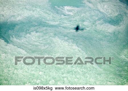 Airplane shadow over cloud, Newport County, Rhode Island, USA View Large Photo Image Stock Image - Airplane shadow over cloud, Newport County, Rhode Island, USA. Fotosearch