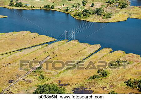 Power lines over water, Newport County, Rhode Island, USA View Large Photo Image Picture - Power lines over water, Newport County, Rhode Island, USA. Fotosearch