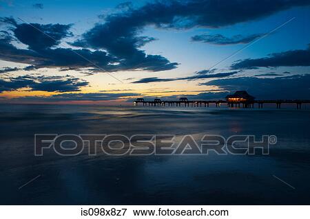 Seaside pier at sunset, Clearwater, Florida View Large Photo Image Stock Photo - Seaside pier at sunset, Clearwater, Florida. Fotosearch