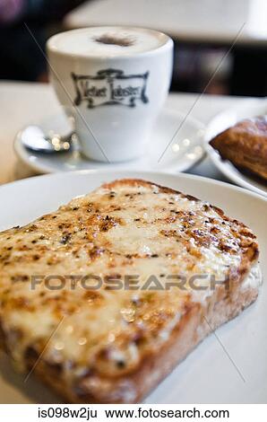 Slice of cheese on toast in cafe View Large Photo Image Stock Photograph - Slice of cheese on toast in cafe. Fotosearch
