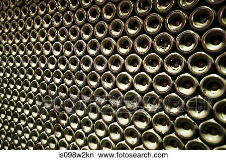 Picture - Stack of wine bottles, full frame. Fotosearch