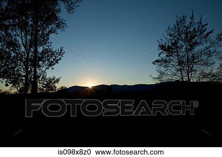 Sunlight and landscape in silhouette View Large Photo Image Stock Image - Sunlight and landscape in silhouette. Fotosearch