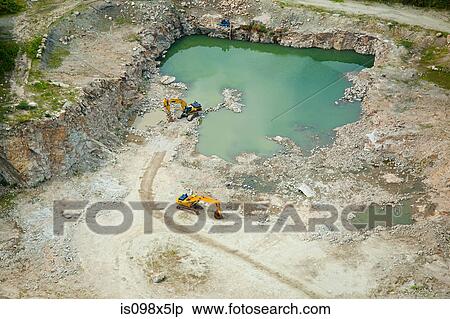 Stock Photography - Two diggers on construction site, Newport County, Rhode Island, USA. Fotosearch