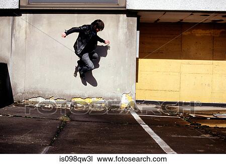 Stock Image - Man jumping. Fotosearch
