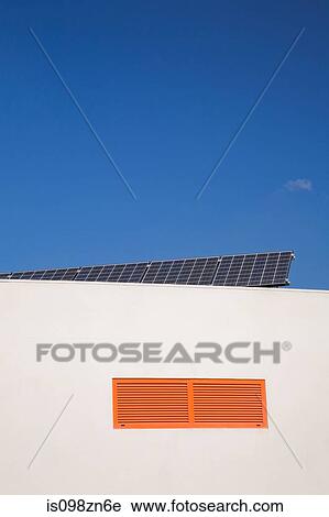 Stock Image - Building and blue sky. Fotosearch
