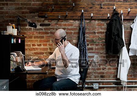 Butcher on telephone View Large Photo Image Stock Image - Butcher on telephone. Fotosearch