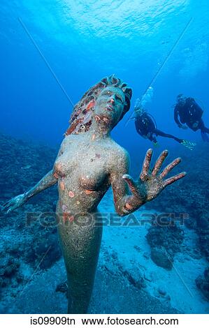 Divers and statue of Amphitrite View Large Photo Image Picture - Divers and statue of Amphitrite. Fotosearch