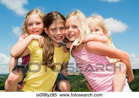 Stock Photography - Four girls, portrait. Fotosearch