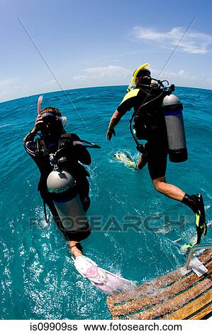 Stock Photograph - Giant stride entry into water. Fotosearch