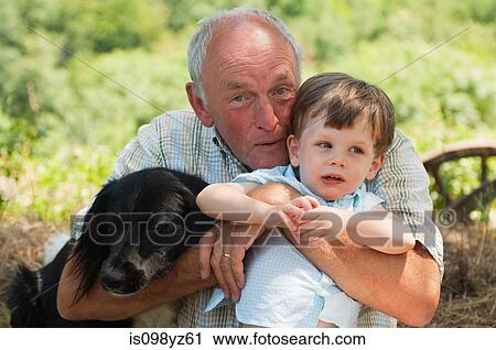 Grandfather and grandson with dog, portrait View Large Photo Image Stock Image - Grandfather and grandson with dog, portrait. Fotosearch