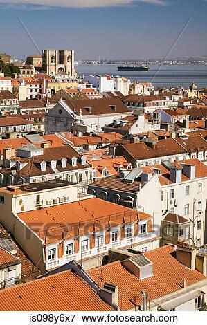 Lisbon rooftops and Tejo River viewed from Santa Justa Lift, Portugal View Large Photo Image Stock Photo - Lisbon rooftops and Tejo River viewed from Santa Justa Lift, Portugal. Fotosearch