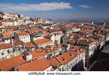 Lisbon rooftops and Tejo River viewed from Santa Justa Lift, Portugal View Large Photo Image Stock Photo - Lisbon rooftops and Tejo River viewed from Santa Justa Lift, Portugal. Fotosearch