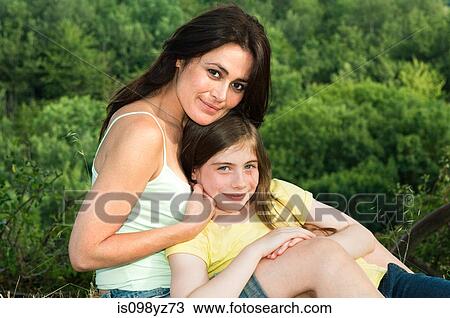 Mother and daughter, portrait View Large Photo Image Stock Image - Mother and daughter, portrait. Fotosearch