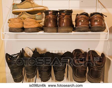 Pairs of boots and shoes View Large Photo Image Stock Image - Pairs of boots and shoes. Fotosearch