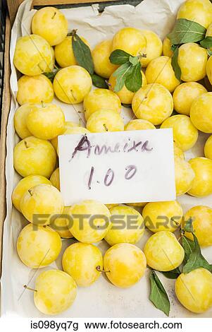 Plums on fruit stall View Large Photo Image Stock Image - Plums on fruit stall. Fotosearch