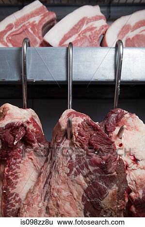 Pork and beef hanging View Large Photo Image Stock Photograph - Pork and beef hanging. Fotosearch