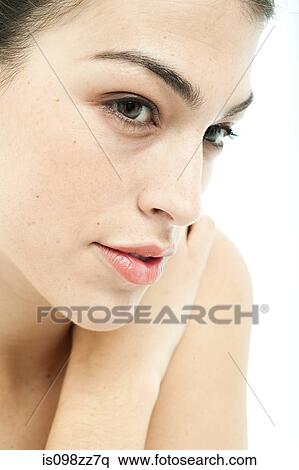 Stock Photography - Portrait of a young woman, close up. Fotosearch