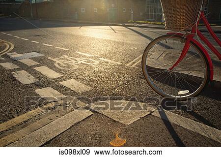 Stock Photo - Road with cycle path and bicycle. Fotosearch