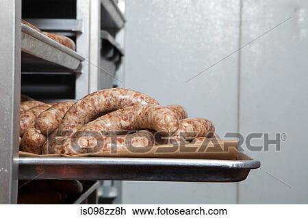 Sausages on tray View Large Photo Image Stock Image - Sausages on tray. Fotosearch