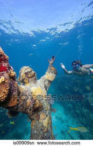 Snorkeler and underwater statue View Large Photo Image Picture - Snorkeler and underwater statue. Fotosearch