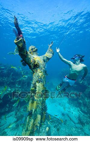 Snorkeler and underwater statue View Large Photo Image Stock Photography - Snorkeler and underwater statue. Fotosearch