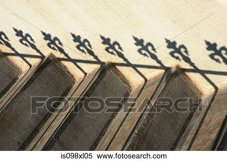 Stock Photography - Steps and railing shadow. Fotosearch