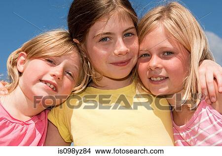 Three girls, portrait View Large Photo Image Picture - Three girls, portrait. Fotosearch