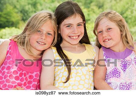 Three girls, portrait View Large Photo Image Stock Photo - Three girls, portrait. Fotosearch