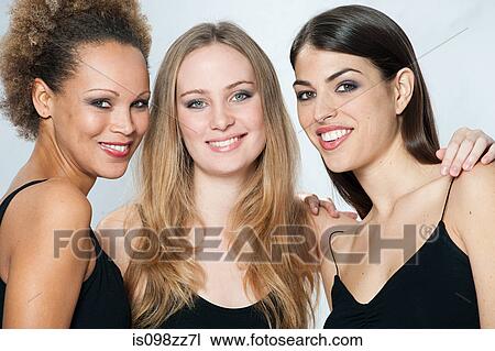 Three young women View Large Photo Image Stock Image - Three young women. Fotosearch