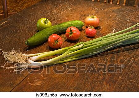 Vegetables on wooden table View Large Photo Image Stock Photograph - Vegetables on wooden table. Fotosearch