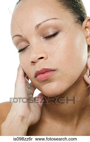 Stock Photography - Woman with eyes closed. Fotosearch