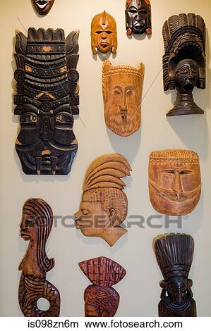 Wooden masks on wall View Large Photo Image Picture - Wooden masks on wall. Fotosearch