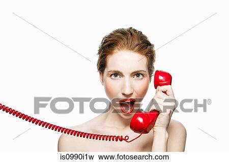 Angry woman holding red telephone View Large Photo Image Stock Photo - Angry woman holding red telephone. Fotosearch