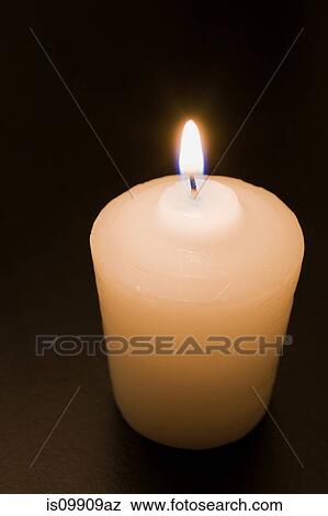 Burning candle on black background View Large Photo Image Stock Photo - Burning candle on black background. Fotosearch
