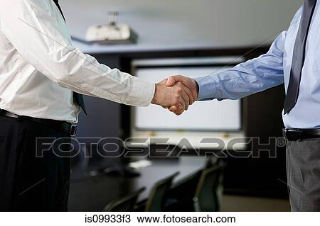 Businessmen shaking hands View Large Photo Image Stock Image - Businessmen shaking hands. Fotosearch