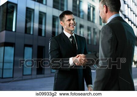 Businessmen shaking hands View Large Photo Image Stock Image - Businessmen shaking hands. Fotosearch