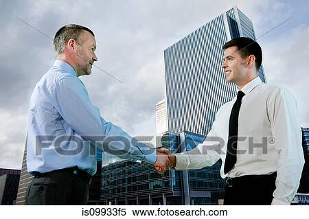 Stock Photography - Businessmen shaking hands. Fotosearch