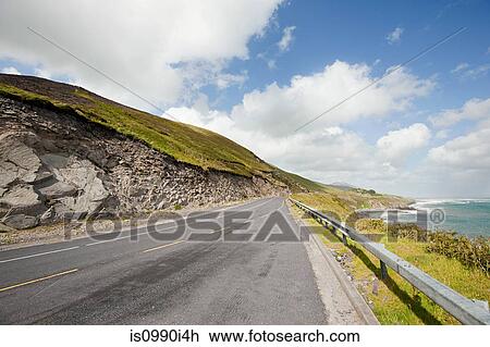 Stock Image - Coastal road by Inch Beach, Republic of Ireland. Fotosearch