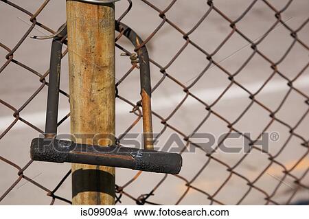 D lock and wire mesh fence View Large Photo Image Picture - D lock and wire mesh fence. Fotosearch