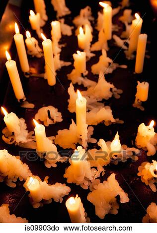 Lit candles, close up View Large Photo Image Picture - Lit candles, close up. Fotosearch