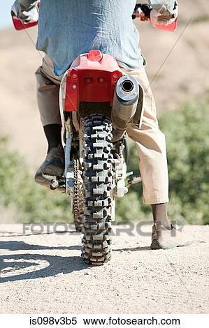 Man riding motorbike View Large Photo Image Stock Photography - Man riding motorbike. Fotosearch