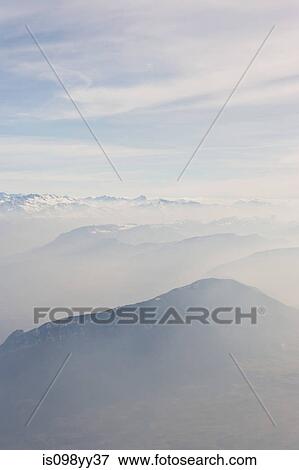 Stock Photo - Misty mountain scenery. Fotosearch
