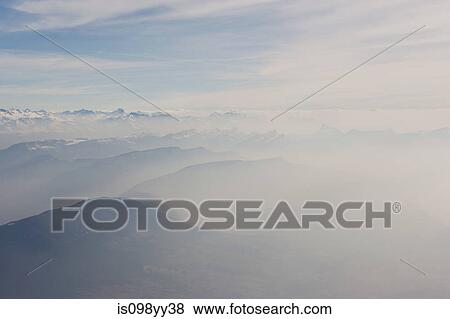 Misty mountain scenery View Large Photo Image Stock Photo - Misty mountain scenery. Fotosearch