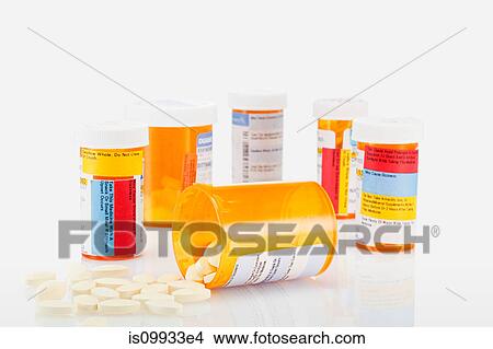 Pill containers and pills spilling View Large Photo Image Picture - Pill containers and pills spilling. Fotosearch